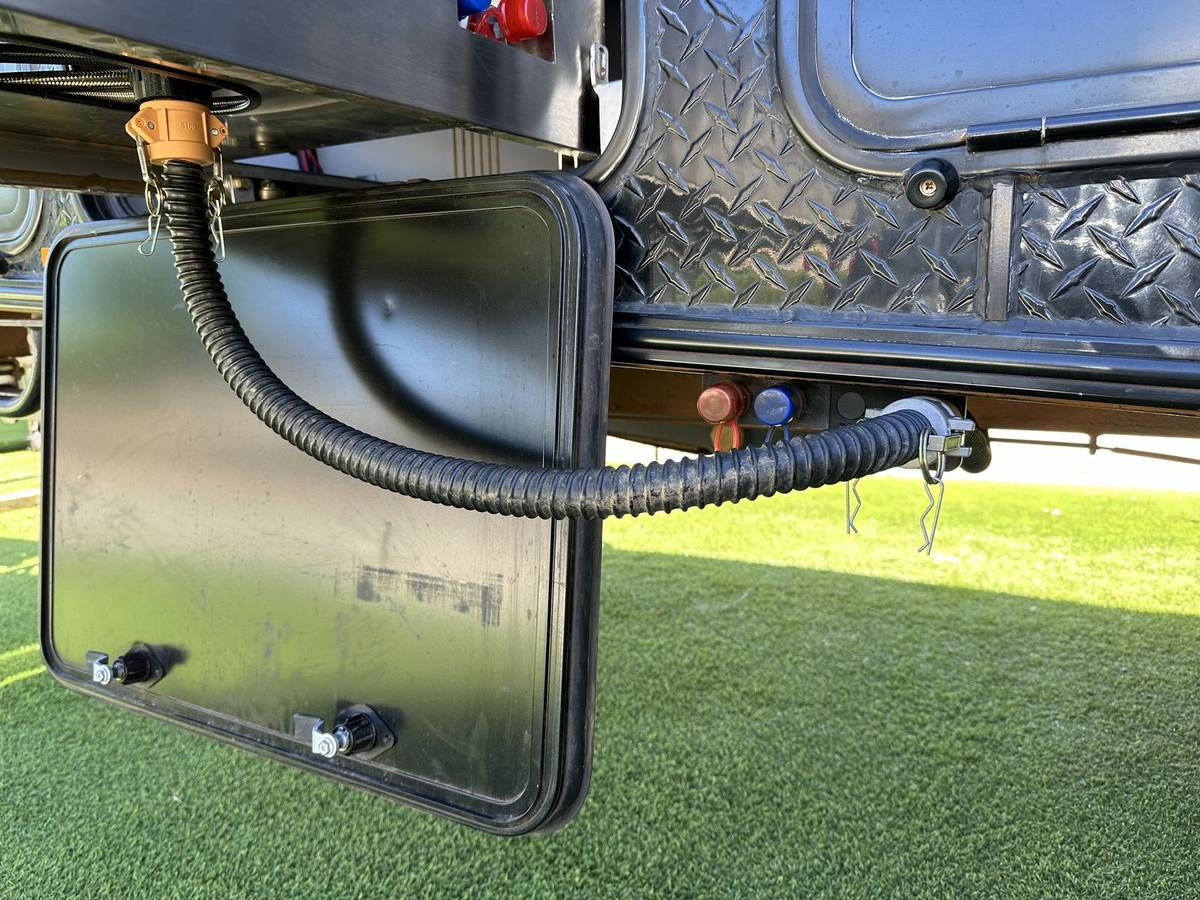 Advanced external kitchen waste water kit installed on a Stoney Creek Scout 15 caravan